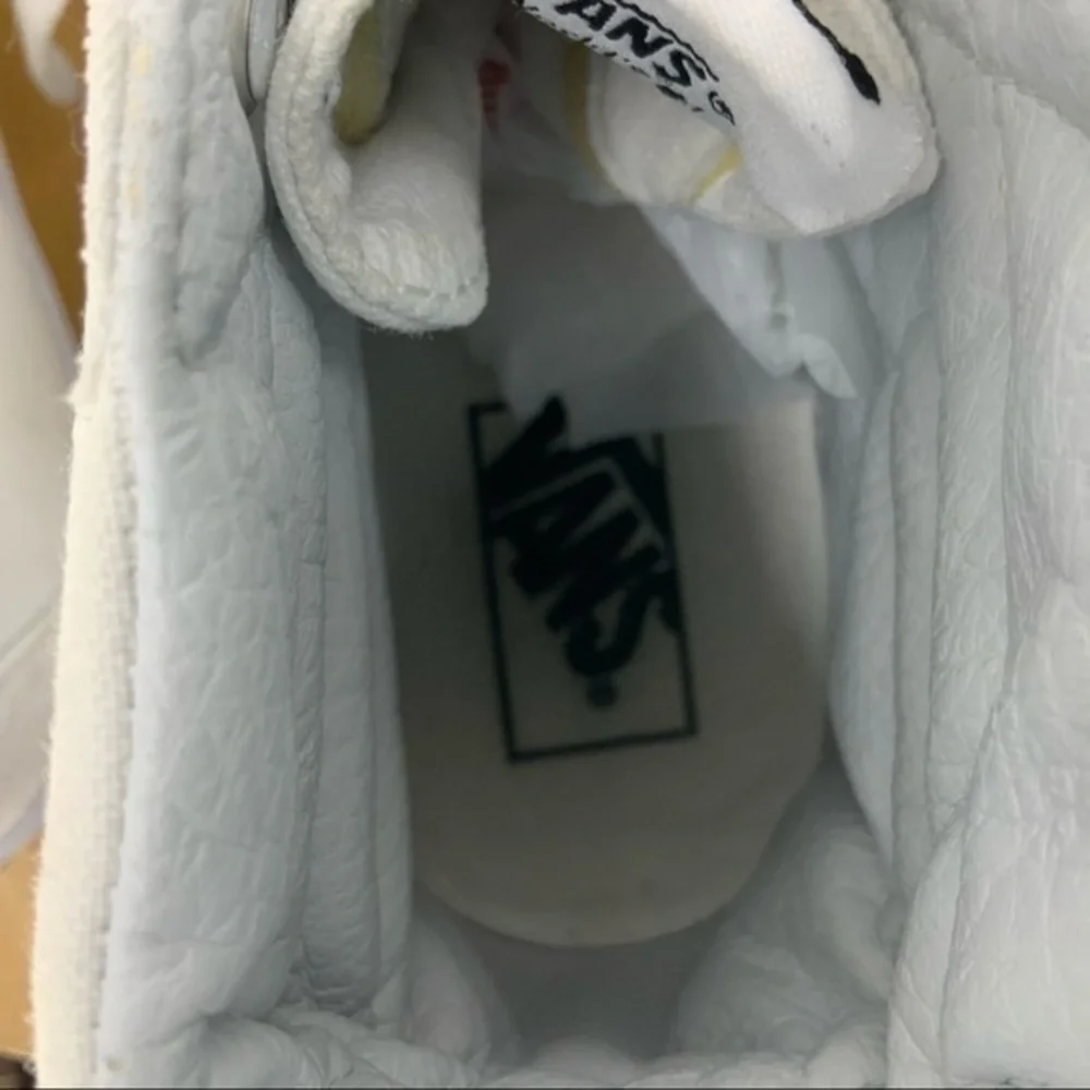 Vans high top skateboard white canvas sneaker